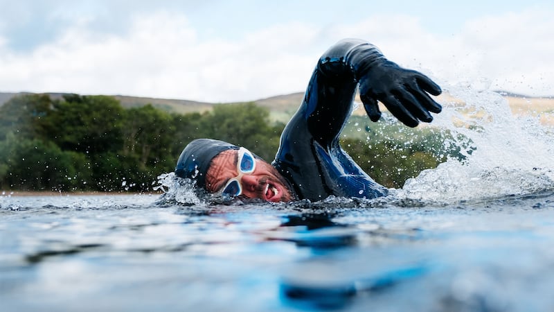 Extreme adventurer Ross Edgley has broken the record for the longest ever open water swim in Loch Ness.