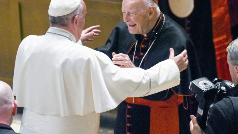 Pope Francis reaches out to hug Archbishop emeritus Theodore McCarrick after an event in Washington in 2015. Picture by Jonathan Newton, The Washington Post via Associated Press, Pool, File.