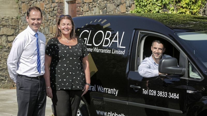 Donnelly Fleet sales manager Tony Magee with Global Home Warranties&#39; Kathy McKenna (managing director) and Maurice Johnston (managing surveyor). Photo: Brian Thompson 
