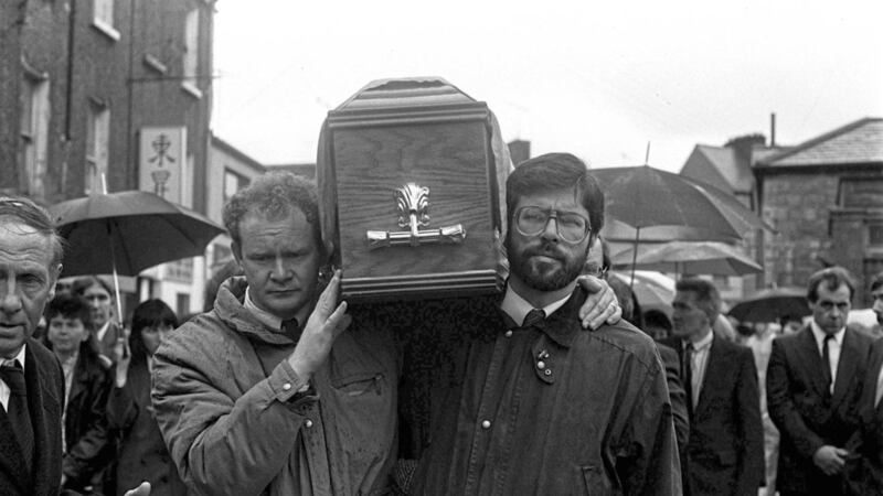 Gerry Adams and Martin McGuinness carry the coffin of Dessie Grew who was shot dead by the SAS at Loughgall. Picture by Pacemaker