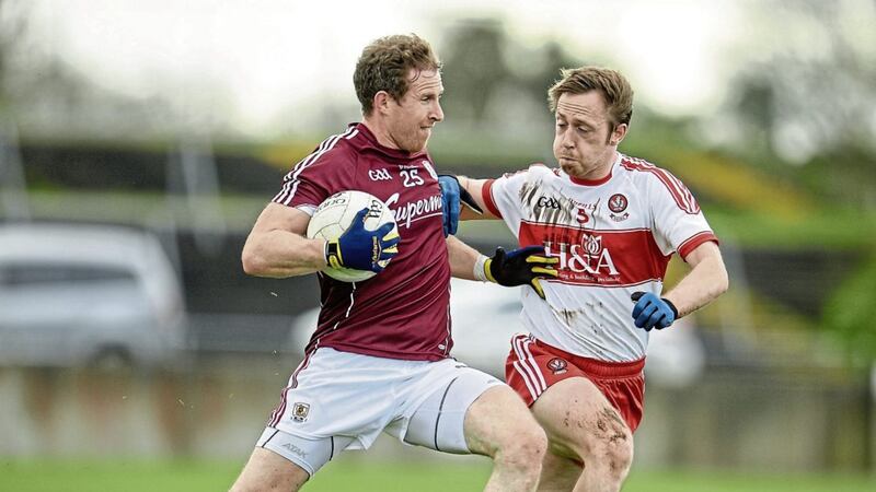 Gary Sice of Galway in action against Neil Forester of Derry Picture by Sportsfile 