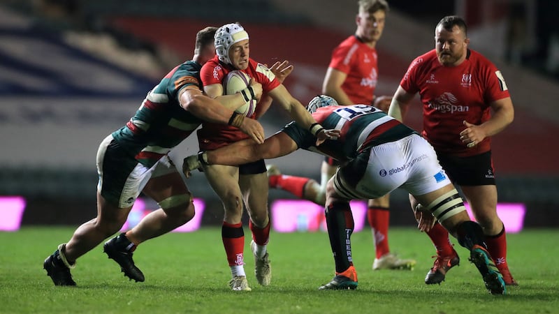 Ulster Rugby's Michael Lowry is tackled by Leicester Tigers' Jasper Wiese (left) and Tomas Lavanini (right) during the European Rugby Challenge Cup semi-final match at Mattioli Woods Welford Road, Leicester on&nbsp;Friday April 30, 2021. Picture by&nbsp;Mike Egerton/PA Wire.&nbsp;