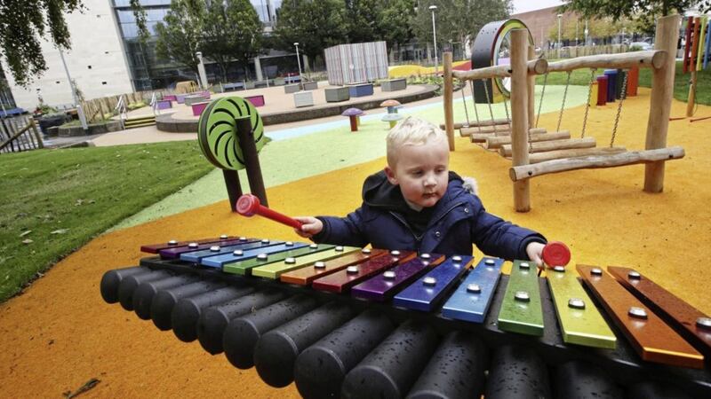 Two year old Taylor from Belfast enjoys a new pop up play park which has opened at Cathedral Gardens in Belfast city centre. Picture by Hugh Russell 