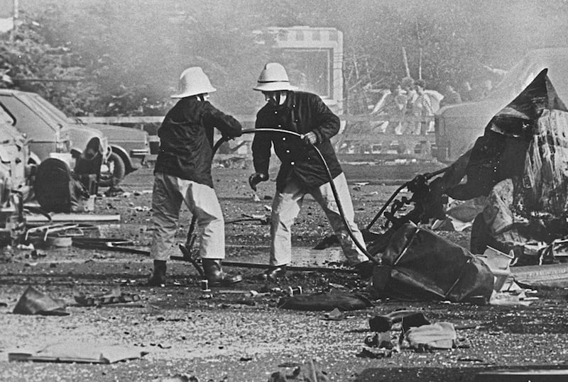 Firefighters at the scene of an IRA bomb attack in Enniskillen in 1984 in which two soldiers were killed and a third died later from his injuries. Picture by Pacemaker 