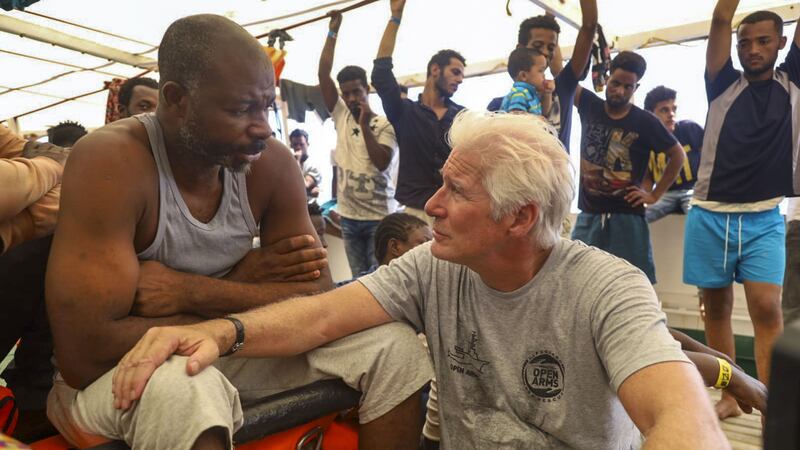 The Hollywood star met rescued migrants on board Spanish humanitarian vessel the Open Arms.