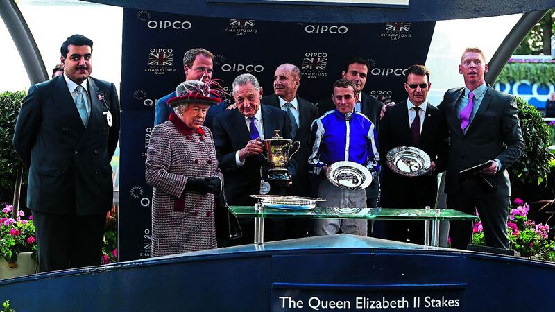 &nbsp;Ryan Moore and Aidan O&rsquo;Brien join connections of Minding after winning the Queen Elizabeth II Stakes during the QIPCO Champions Day