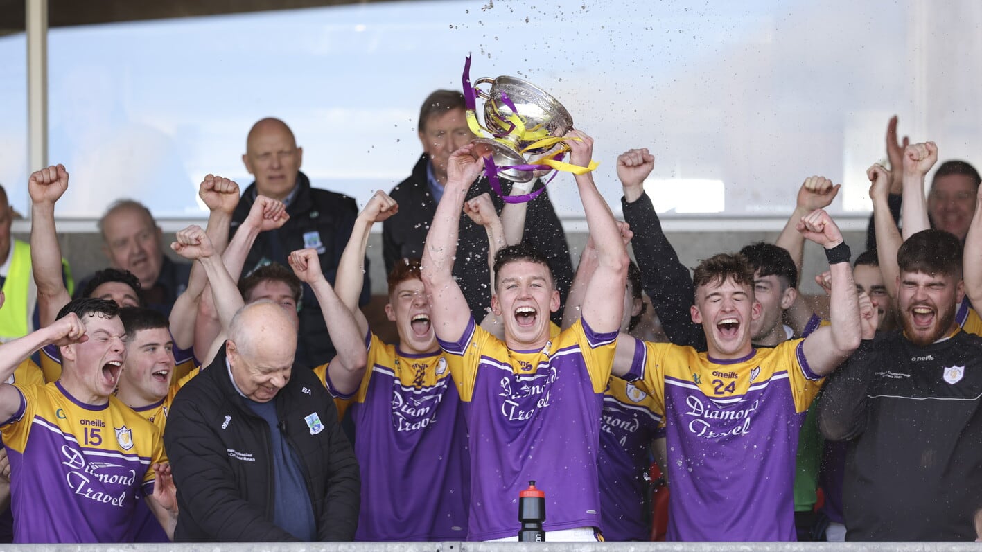 Derrygonnelly Harps captain Shane McGullion lifts the Fermanagh SFC trophy.