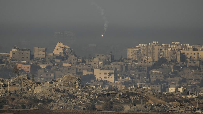 An Israeli army flare is seen over the Gaza Strip (Leo Correa/AP)