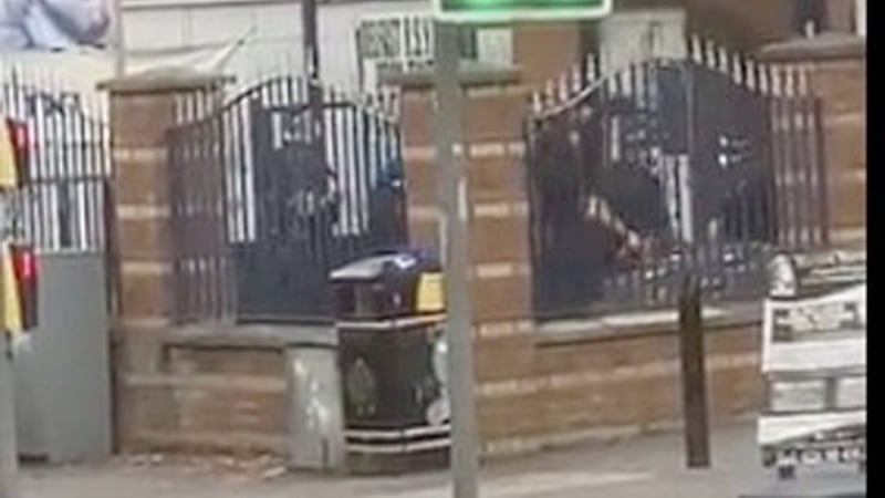 PSNI officers outside an IRSP office west Belfast today