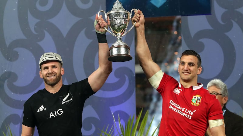 British and Irish Lions captain Sam Warburton and New Zealand's Kieran Read lift the Series Trophy after the series is drawn during the third test of the 2017 British and Irish Lions tour at Eden Park, Auckland<br />&nbsp;