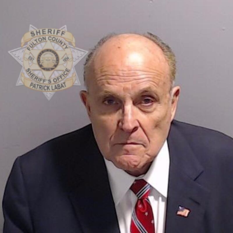Rudy Giuliani after he surrendered and was booked at the Fulton County Jail in Atlanta in August (Fulton County Sheriff’s Office/AP)