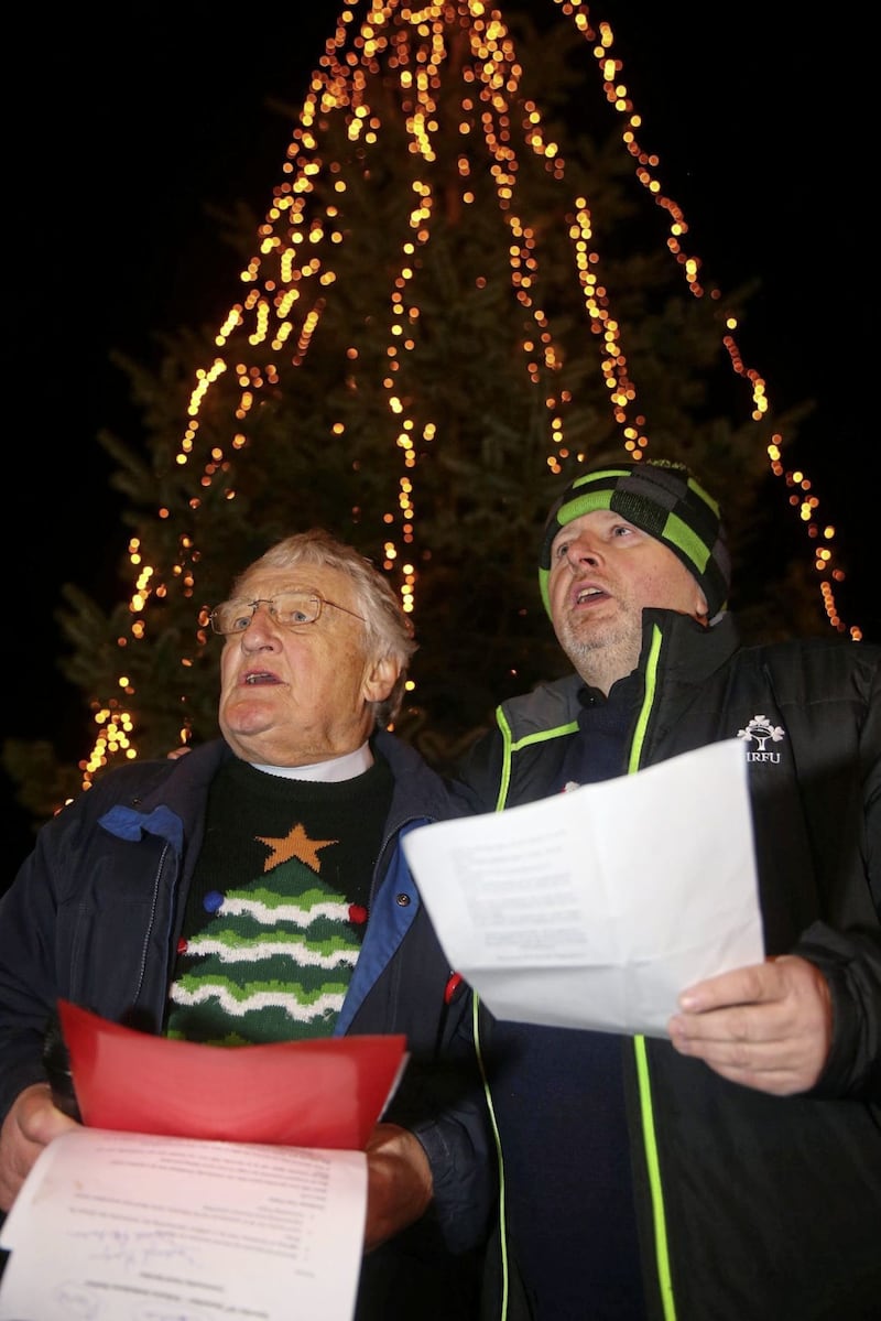 First ever cross community carol service and Chritmas tree lighting at Ardoyne in north Belfast orginsied by Rev Harold Good and Fr Gary Donegan Picture Mal McCann 