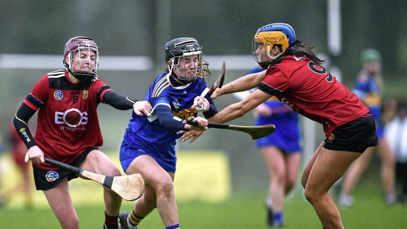 Tipperary&#39;s Grace O&#39;Brien is challenged by Aoife Keown and Clara Cowan of Down during the Littlewoods Ireland Camogie League Division One match at The Ragg Picture: Tommy Grealy/Inpho 