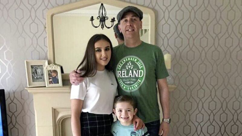 Darren Kennedy, pictured with his children Hannah and Darach 