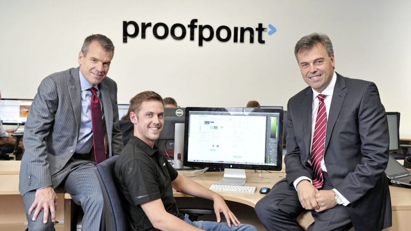 Outgoing Invest NI boss Alastair Hamilton pictured five years at Proofpoint&#39;s Weavers Court office with company chief executive Gary Steele (left) and software engineer, David Saunders. Picture: Michael Cooper 