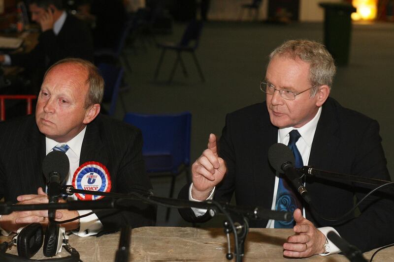 An unhappy Jim Allister with Sinn Fein's Martin McGuinness at the counting of ballots cast in the 2011 European elections in Northern Ireland&nbsp;