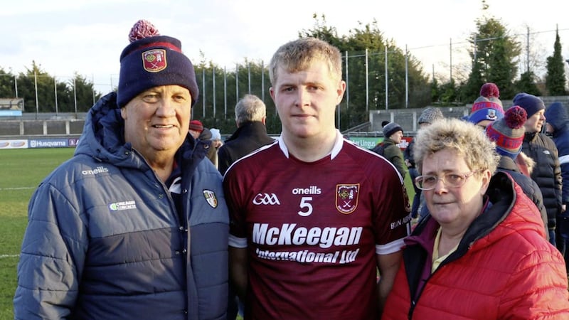 Eoghan Campbell with his mother and father after Cushendall&#39;s All-Ireland Club semi-final loss to St Thomas&#39;s in 2019 Picture: Sean Paul McKillop 