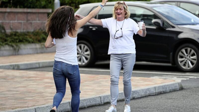 Emer Maguire celebrates with her mother Ciara Maguire at Our Lady and Saint Patrick&#39;s College, Belfast. Picture by Brian Lawless/PA Wire 