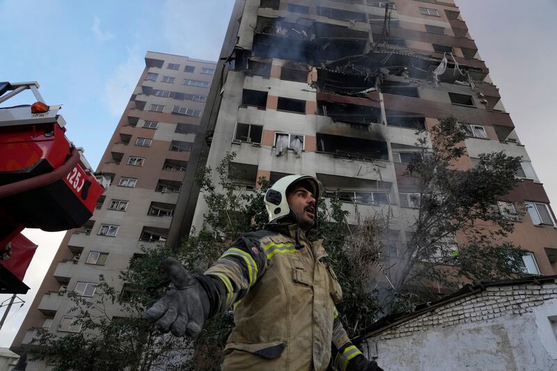 The scene of an explosion in a residence compound in northern Tehran (Vahid Salemi/AP)