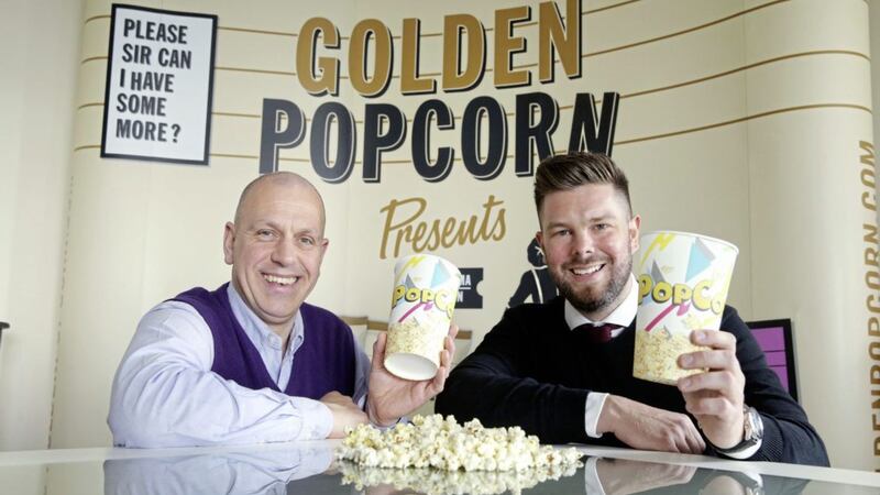Golden Popcorn&#39;s Sean McClinton (right) with Invest NI director of food and drink John Hood. Photo: Kelvin Boyes/Press Eye 