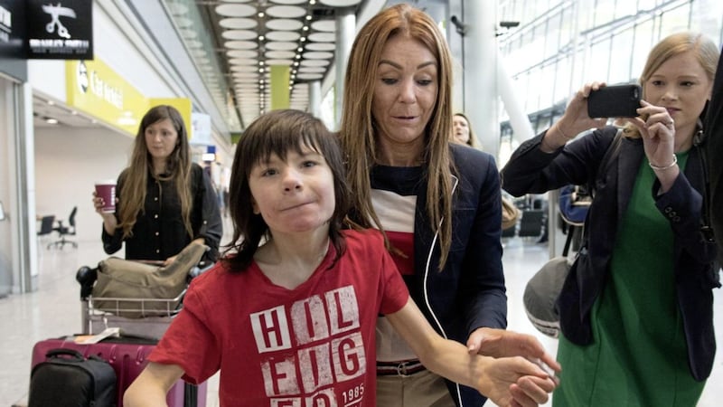 Charlotte Caldwell and her son Billy at Heathrow Airport after having a supply of cannabis oil used to treat his severe epilepsy confiscated on their return from Canada. Picture by Stefan Rousseau/PA Wire