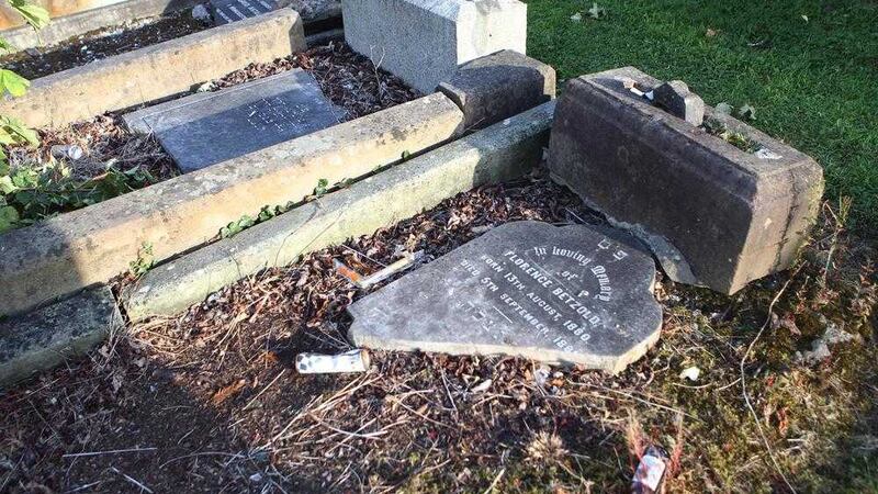 Some of the damaged headstones in the Jewish plot at Belfast City Cemetery. Picture by Matt Bohill 