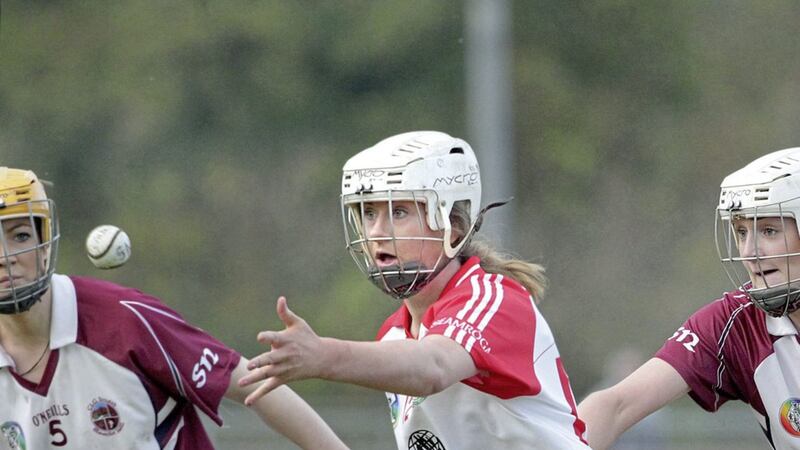 Slaughtneil&#39;s Siobhan McKaigue with Emma McMullan and Chloe Higgins of Loughgiel during the 2016 Ulster Senior Club Camogie final replay at Maghera. Picture by Margaret McLaughlin. 