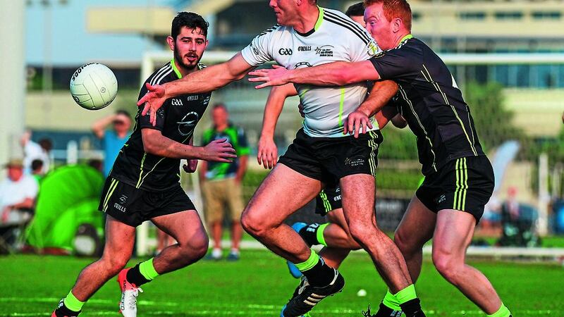 Neil Gallagher, representing the 2015 Allstars, in action against Donegal team-mate Ryan McHugh (left) of the 2016 Allstars during yesterday&rsquo;s tour game at the Sheikh Zayed Sports City Stadium in Abu Dhabi, United Arab Emirates&nbsp;