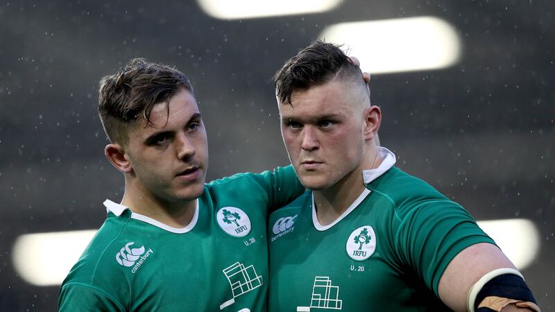 Ireland's Adam McBurney and with current Ireland prop Andrew Porter following their team’s defeat in the 2016 World Rugby U20 Championship Final in Manchester           Picture: Ryan Byrne/Inpho