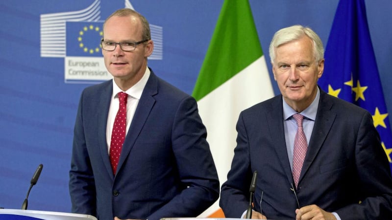 European Union chief Brexit negotiator Michel Barnier, right, at a media conference with Irish foreign minister Simon Coveney at EU headquarters in Brussels yesterday. Barnier and Coveney underscored their tight bonds as they seek to tackle the separation of the UK from the EU, something which could have a profound effect on Ireland, north and south PICTURE: Virginia Mayo 