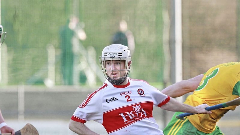 Donegal&#39;s Danny Cullen closes down Colm Murphy of Derry at O&#39;Donnell Park, Letterkenny. Picture by Margaret McLaughlin. 