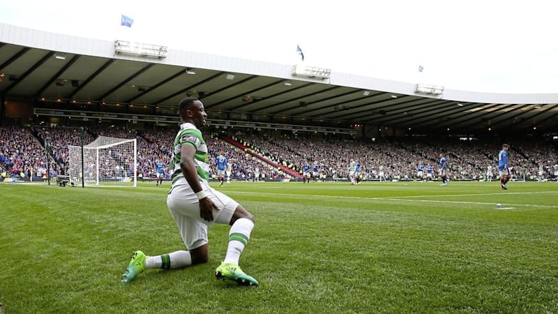 Celtic striker Moussa Dembele grips his hamstring during the William Hill Scottish Cup semi-final victory over Rangers last weekend Picture: PA 