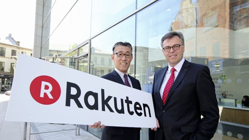 Yasufumi Hirai from Rakuten and chief executive of Invest NI Alastair Hamilton. E-Commerice firm Rakuten has just announced 20 new jobs as part of an investment in Belfast. Picture by Kelvin Boyes/Press Eye   