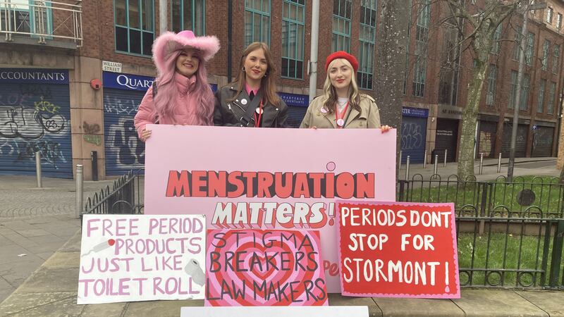 Maedbh Donaghy, Katrina McDonnell and Katie Bryce at the International Women’s Day rally in Belfast. They are involved in the group The Homeless Period which is campaigning against the indignity of period poverty