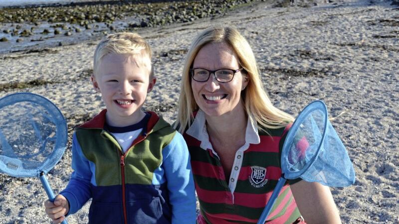 Maggie Finlay, founder of Beach Schools NI with her three-year-old son Joshua get set to do some exploring 