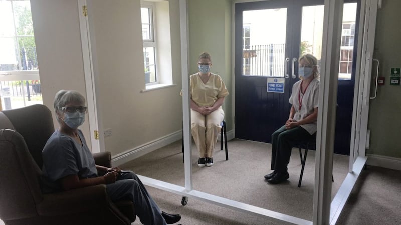 A Co Down care home has erected a `visitor pod&#39; in its lounge so its residents and their loved ones can be reunited after 12 weeks apart 