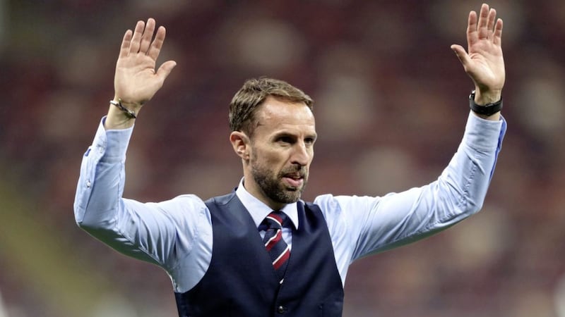 England manager Gareth Southgate salutes the England fans after defeat to Croatia 