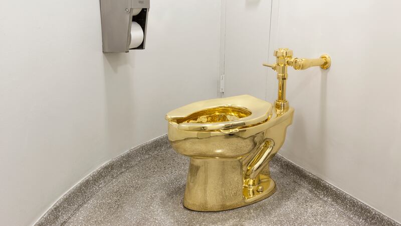 The fully functioning toilet, titled America, was created by Italian artist Maurizio Cattelan and housed in the Oxfordshire country house where Sir Winston Churchill was born
