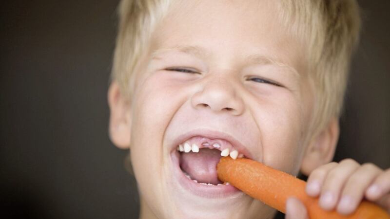 Giving harder foods like uncooked vegetables can help stimulate larger jaws, giving more room for teeth and meaning less likelihood of needing braces 