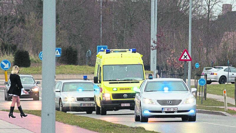 An police convoy and ambulance thought to be carrying captured fugitive Salah Abdeslam arrives at the federal penitentary in Bruges, Belgium. Picture by Geoffroy Van der Hasselt, Associated Press