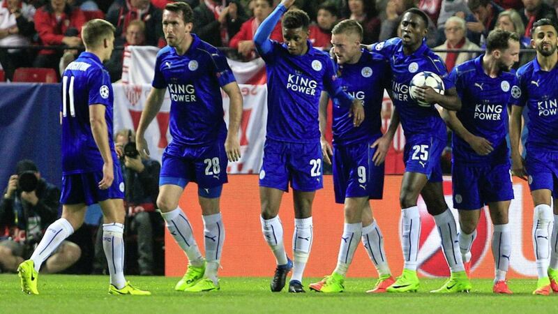 Leicester&#39;s Jamie Vardy, centre, celebrates after his crucial away goal against Sevilla 