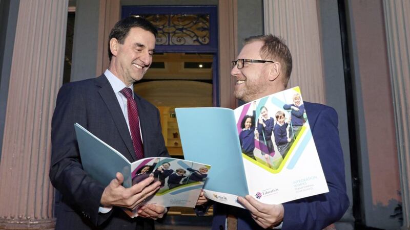 Permanent secretary Derek Baker with Jason Milligan, principal Killyleagh IPS. Picture by Declan Roughan 