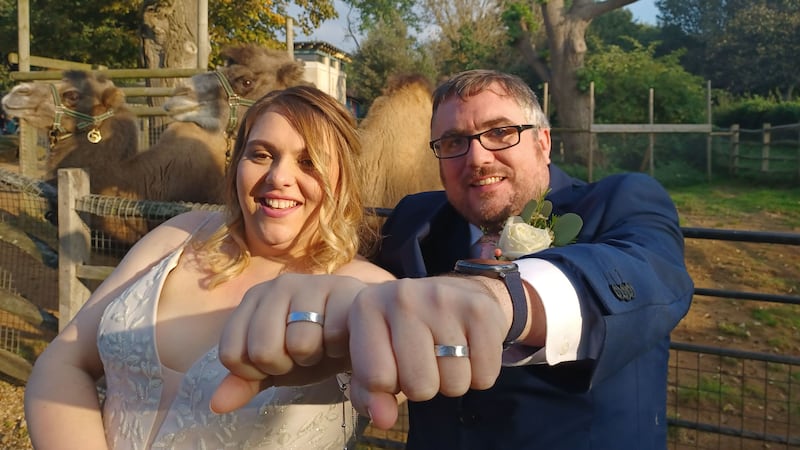 The pair exchanged unique wedding bands made from recycled mesh that once covered the Zoo’s Snowdon Aviary.