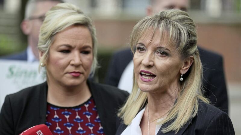 Sinn F&eacute;in MLA Martina Anderson, right, with party deputy leader Michelle O&#39;Neill. Ms Anderson apologised for much-criticised comments she made on social media regarding pensions for people injured during the Troubles. Picture by Brian Lawless/PA 