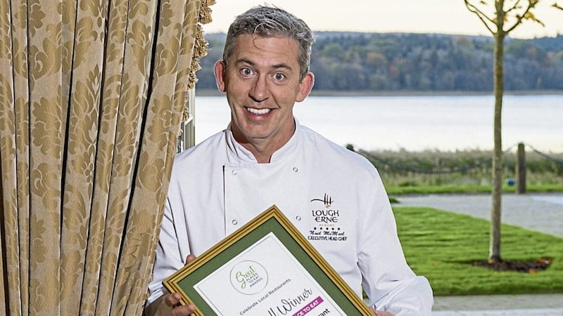 Noel McMeel with his Irish News Greatest Place to Eat Award. Picture by Ronan McGrade 