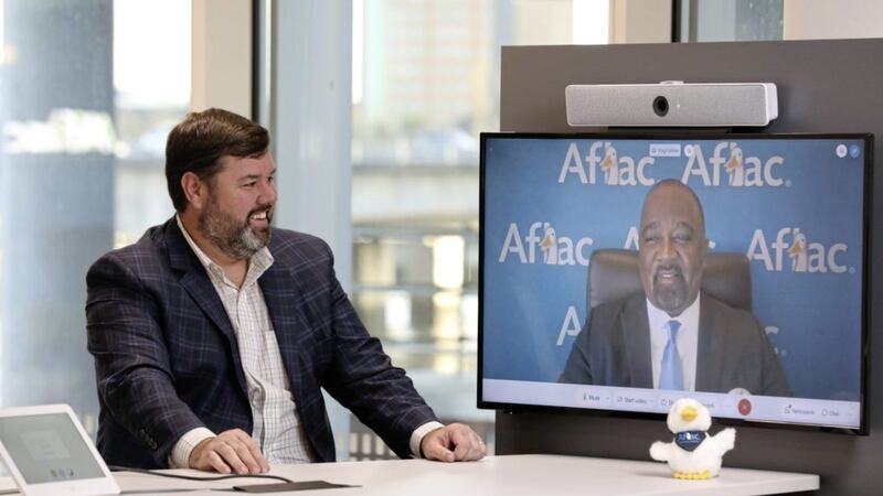 Head of Aflac&#39;s Belfast&#39;s operation, Keith Farley, speaking with Aflac&#39;s executive vice president, Virgil Miller. Picture by Matt Mackey/Presseye 