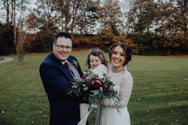 Leancha Smith on her wedding day in 2018, with husband Christopher and their daughter Meabh.