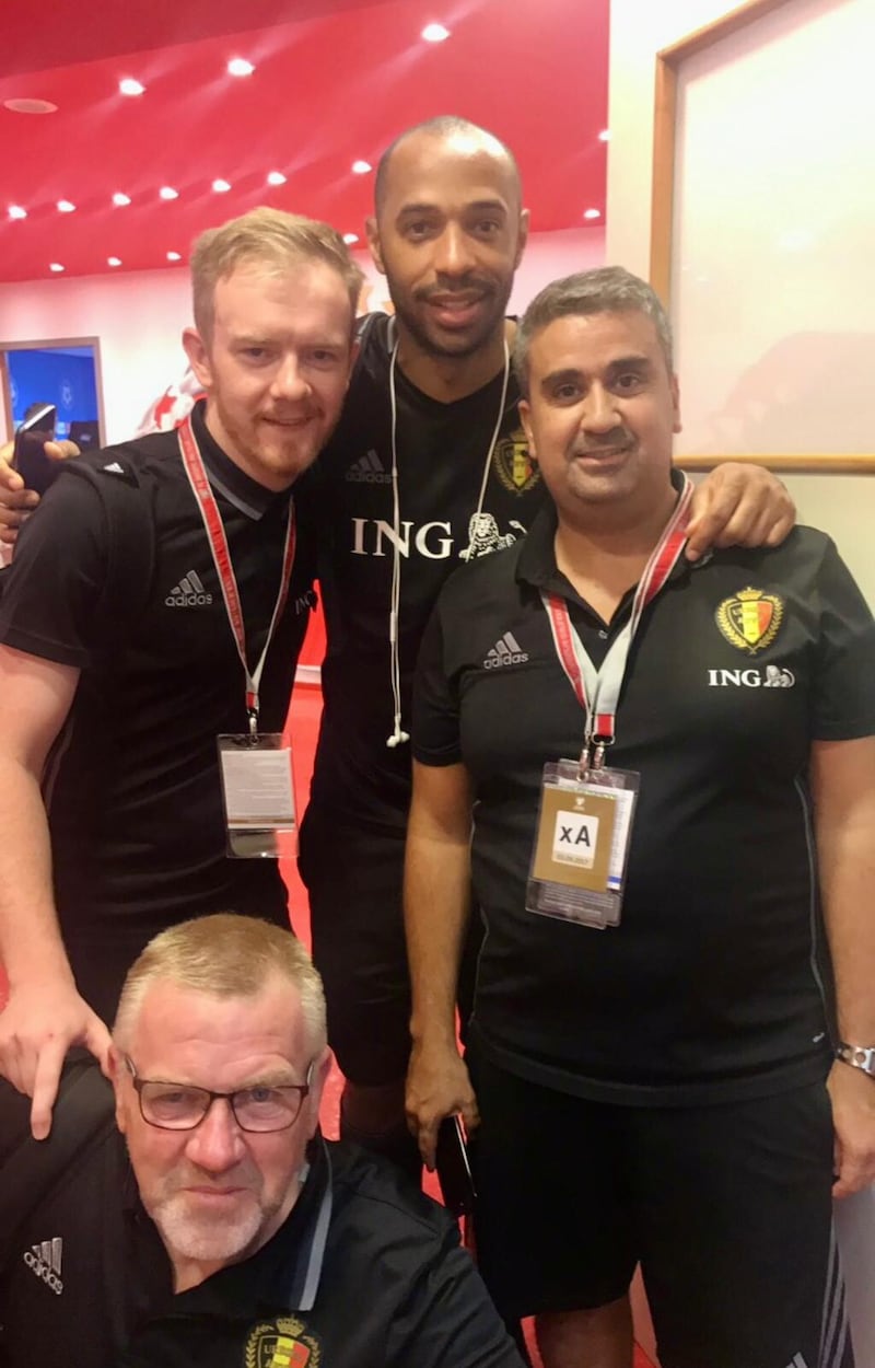 Turlough (left) celebrates Belgium's qualification for the 2018 World Cup with Thierry Henry (coach) and Mousa El Habchi (Video Analyst) and Eddy Pepels (massage therapist) 