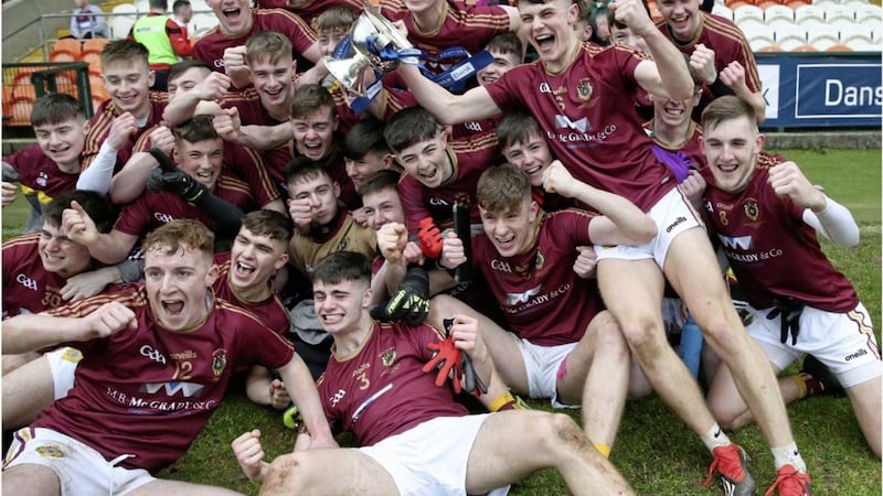 Niall Laverty, bottom left, celebrates with his St Patrick&#39;s Grammar School team-mates after their MacLarnon Cup final win over Cathair Dhoire back in March. Picture by Hugh Russell 