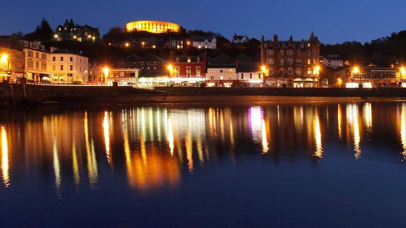 The view across the bay towards McCaig's Tower at dusk in Oban, Argyll. Picture: Paul Tomkins/VisitScotland